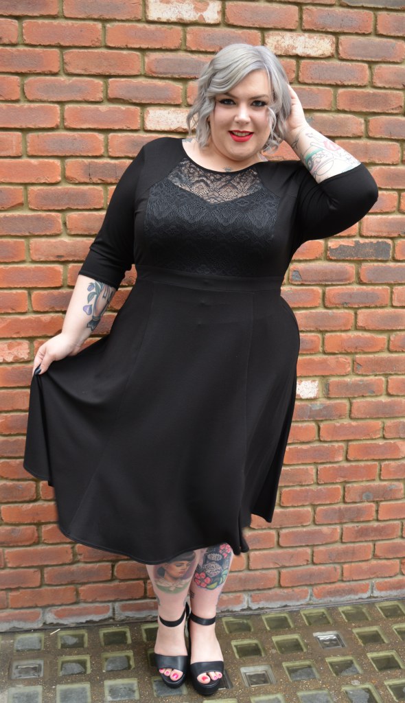 The stunning Nancy showing us how to work an LBD. 